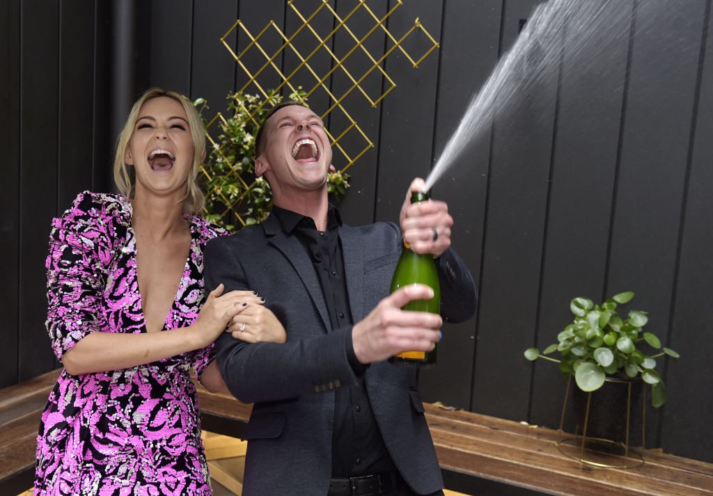 Tess and Luke celebrating their win - Domain