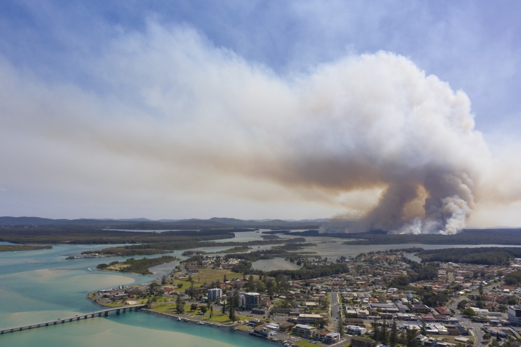 Smoke billowing over the town of Tuncurry.